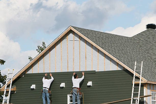 Professional Siding Installation technician working in Colonial Heights, VA